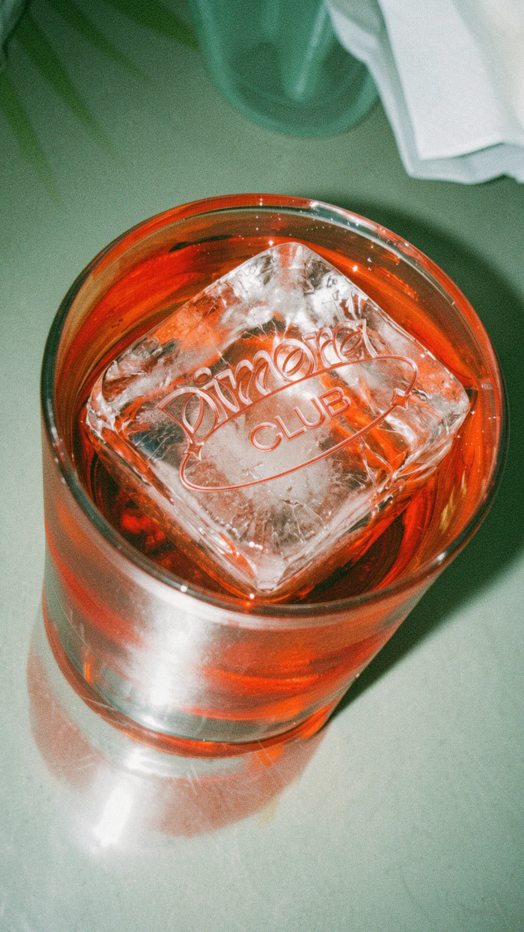 A negroni with a Dimora-branded ice cube